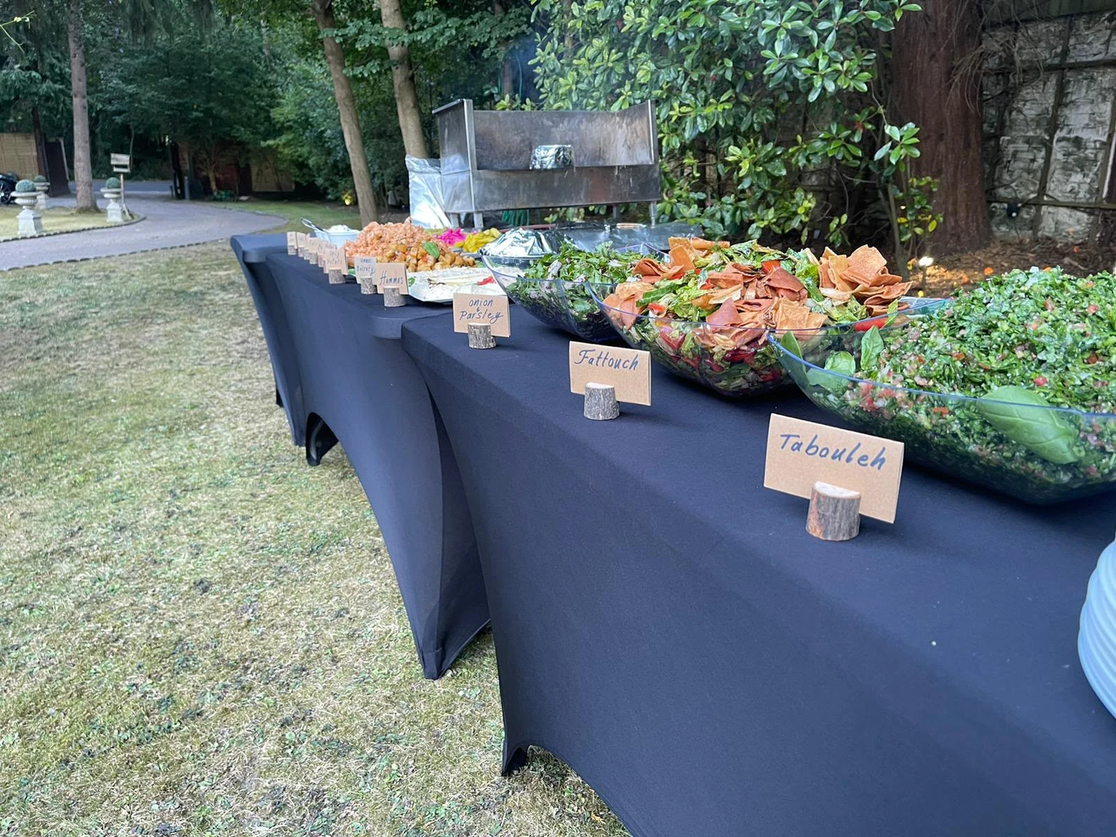 A labelled salad buffet at a David's Deli catering event