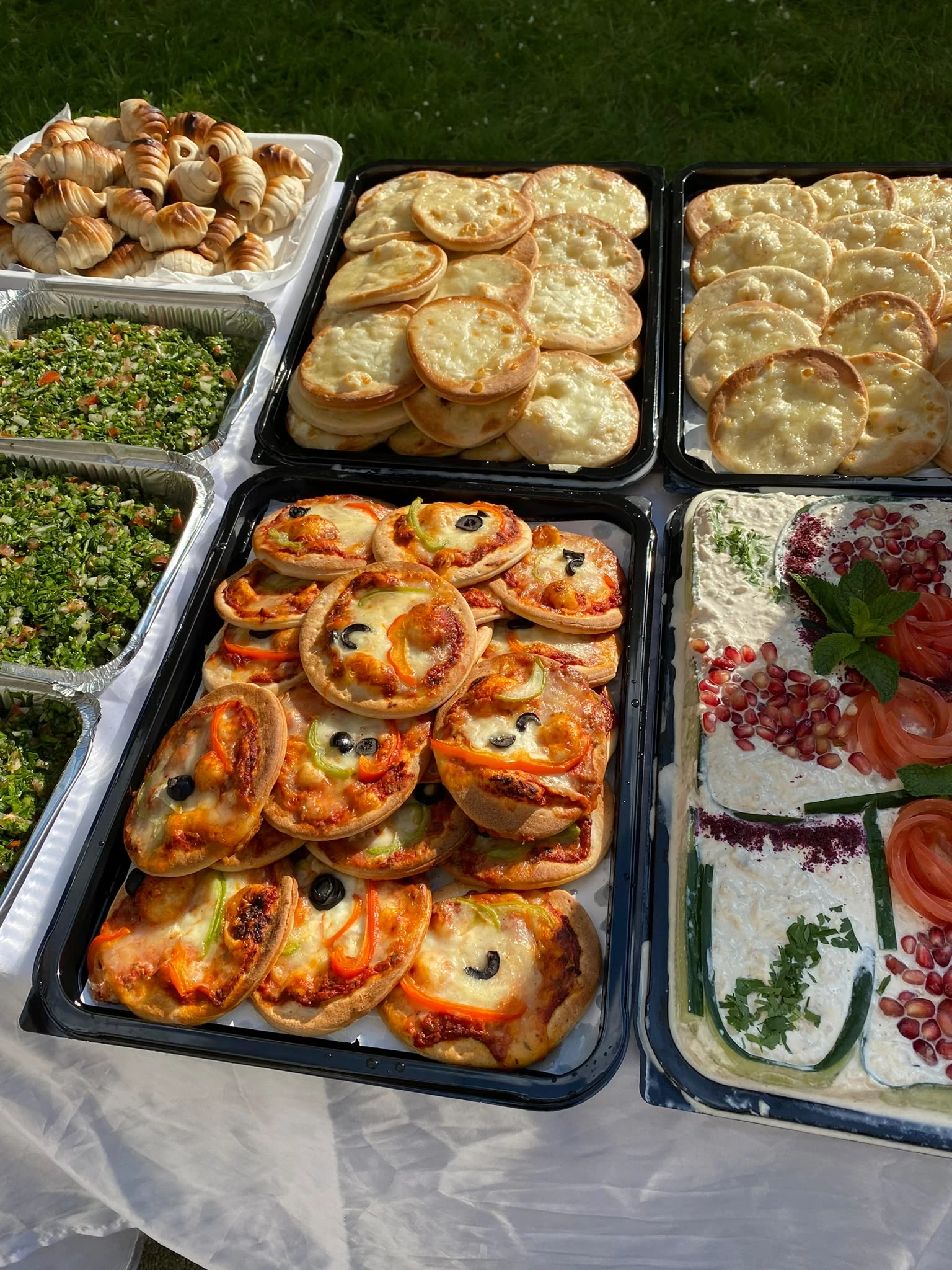 Mini pizzas and catering dishes prepared by David's Deli