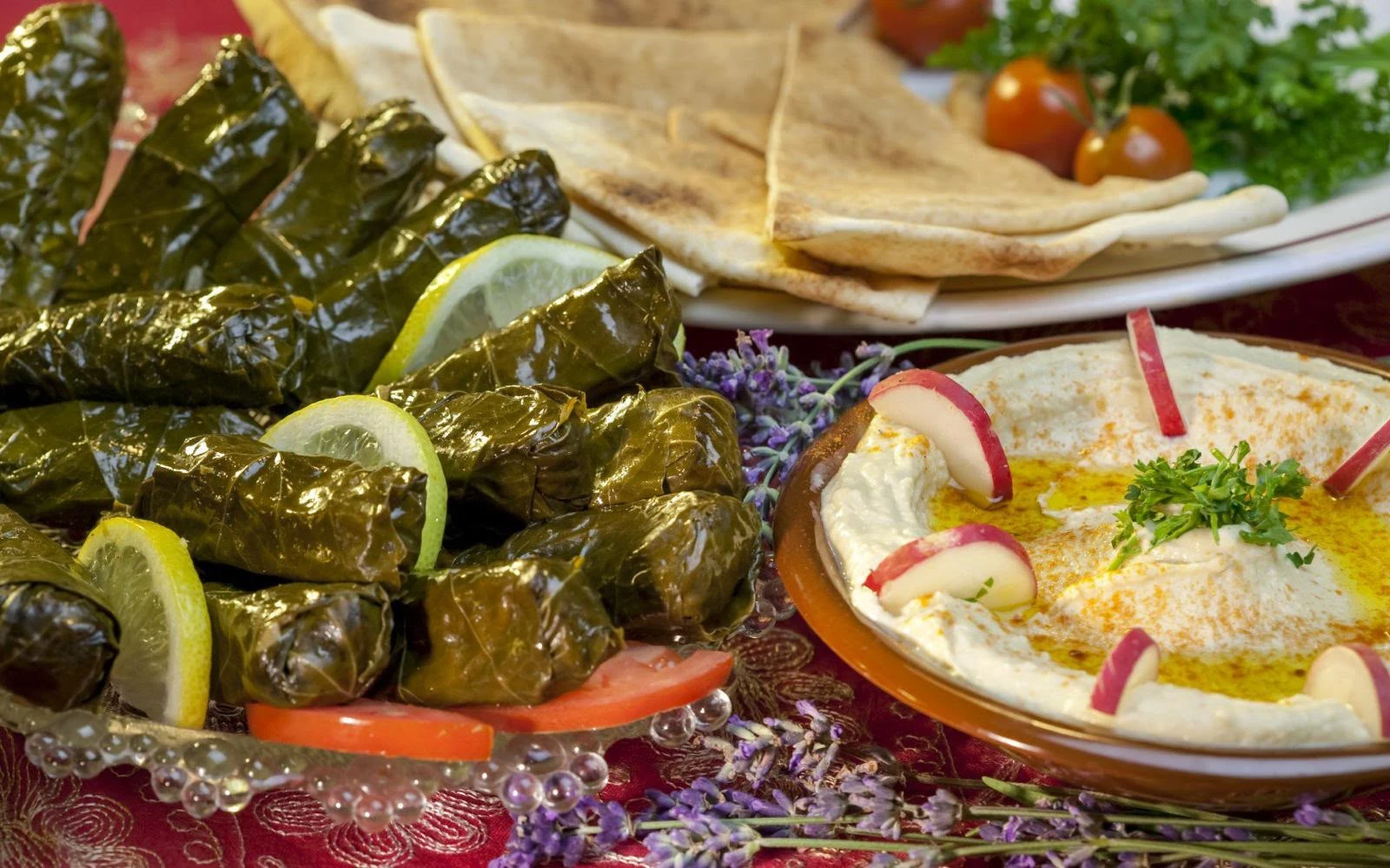 Vine leaves, hummus and flatbread from David's Deli